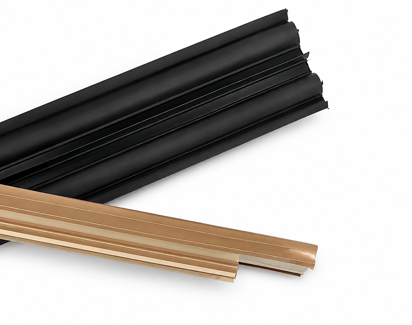 Black and beige door sweeps and trim pieces from BioPlastic Solutions, showcasing their custom extrusion capabilities.