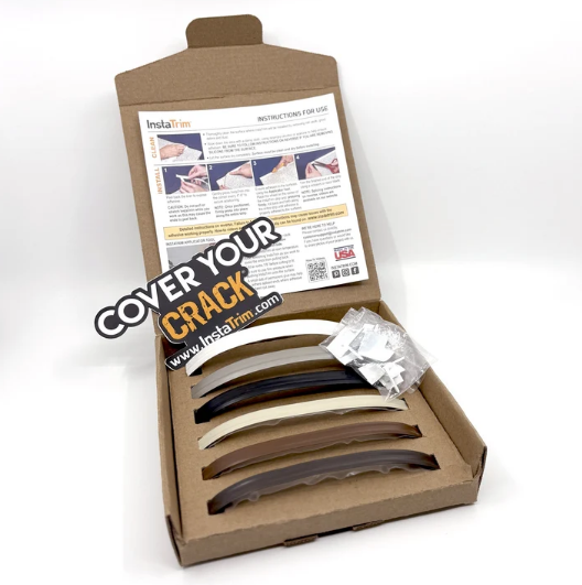 Open box displaying Instatrim flexible trims in various colors, with installation instructions and a "Cover Your Crack" sticker.